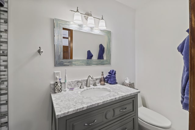 215 Whitehead St, Key West, FL 33040 - bathroom featuring vanity and toilet
