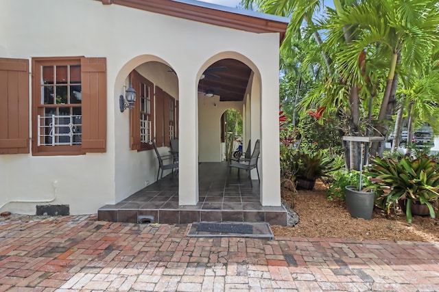 215 Whitehead St, Key West, FL 33040 - property entrance featuring stucco siding and covered porch