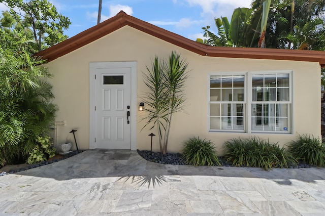 215 Whitehead St, Key West, FL 33040 - entrance to property with stucco siding