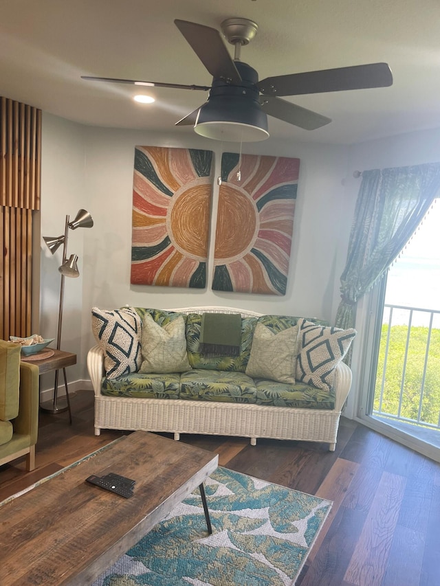 interior space with a ceiling fan and wood finished floors