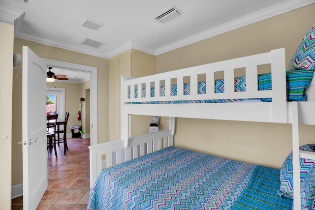 tiled bedroom with crown molding