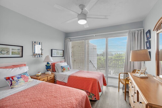 bedroom featuring ceiling fan and light hardwood / wood-style floors