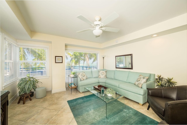 105 Front St Unit 121, Key West, FL 33040 - living area with baseboards, ceiling fan, and light tile patterned floors
