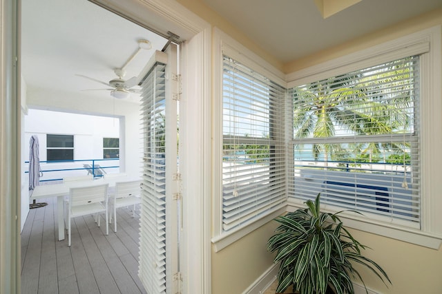 105 Front St Unit 121, Key West, FL 33040 - hall featuring a healthy amount of sunlight and wood finished floors