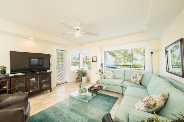 105 Front St Unit 121, Key West, FL 33040 - living room featuring baseboards, a ceiling fan, and light tile patterned flooring