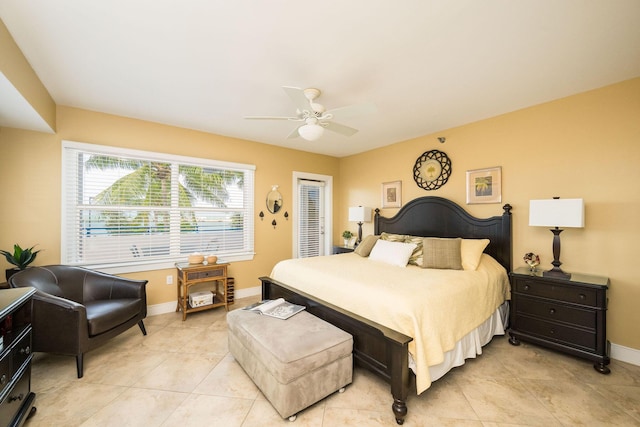 105 Front St Unit 121, Key West, FL 33040 - bedroom with a ceiling fan, baseboards, and light tile patterned floors