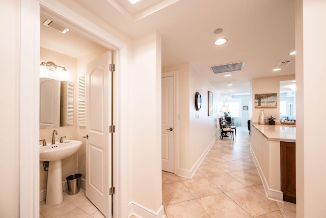 105 Front St Unit 121, Key West, FL 33040 - corridor with visible vents, recessed lighting, and light tile patterned floors