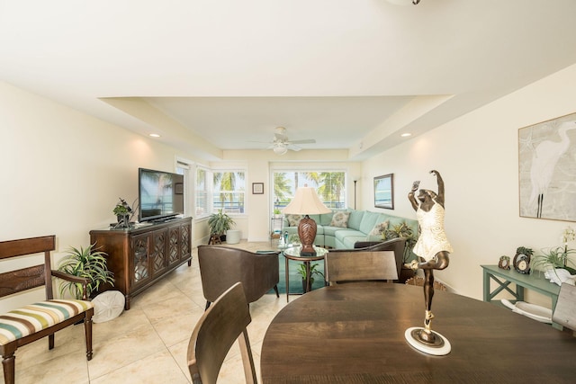 105 Front St Unit 121, Key West, FL 33040 - living area featuring light tile patterned flooring, ceiling fan, and a raised ceiling