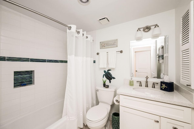 105 Front St Unit 121, Key West, FL 33040 - full bathroom featuring visible vents, shower / bath combo, toilet, and vanity
