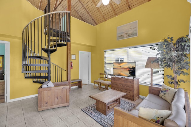 living area featuring tile patterned floors, high vaulted ceiling, wooden ceiling, and stairs