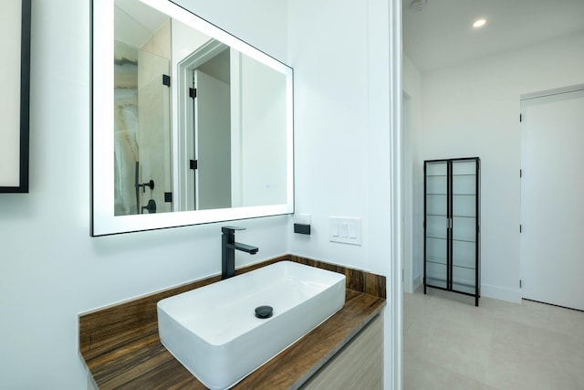 94825 Overseas Hwy Unit 174, Key Largo, FL 33037 - bathroom with vanity and recessed lighting