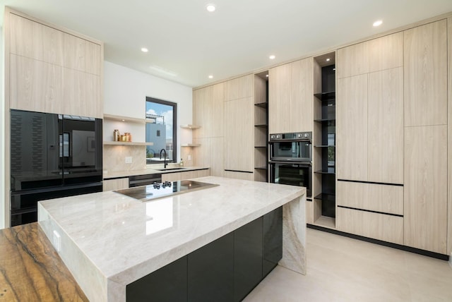 94825 Overseas Hwy Unit 174, Key Largo, FL 33037 - kitchen with open shelves, modern cabinets, light brown cabinets, a center island, and black appliances