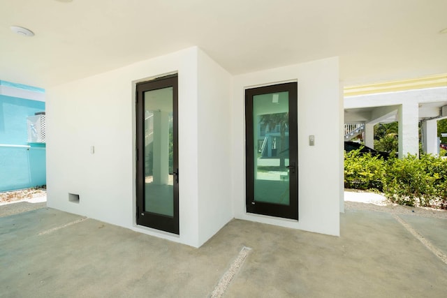 94825 Overseas Hwy Unit 174, Key Largo, FL 33037 - entrance to property with a patio area and stucco siding