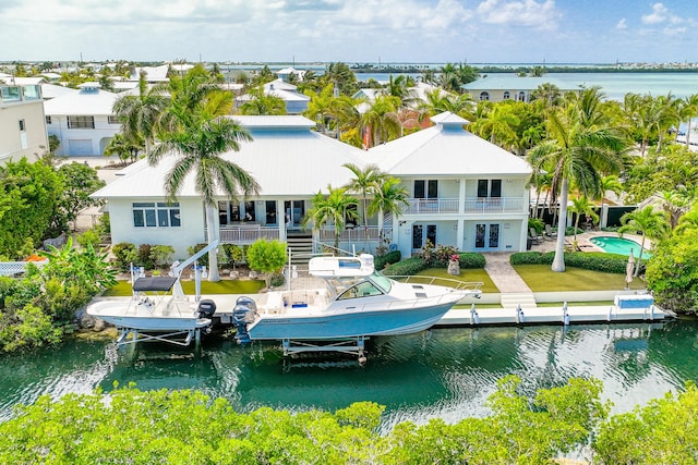 exterior space with a water view