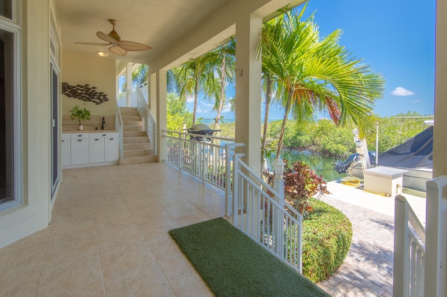 balcony featuring sink, a patio, and ceiling fan