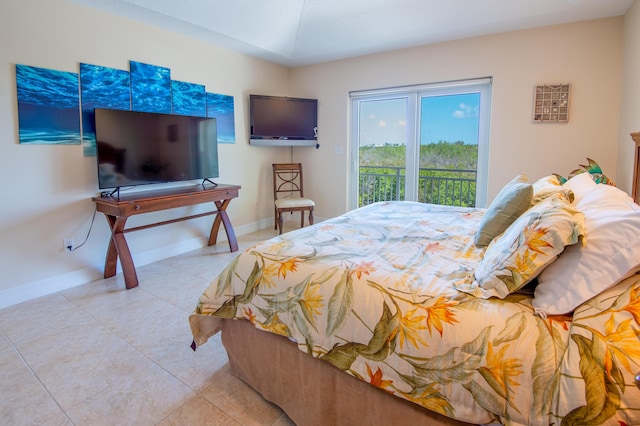 bedroom with light tile patterned floors