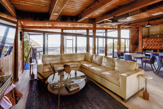 living room with beam ceiling, wooden ceiling, ceiling fan, and hardwood / wood-style flooring