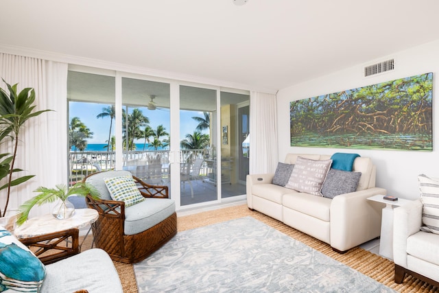 sunroom with a water view