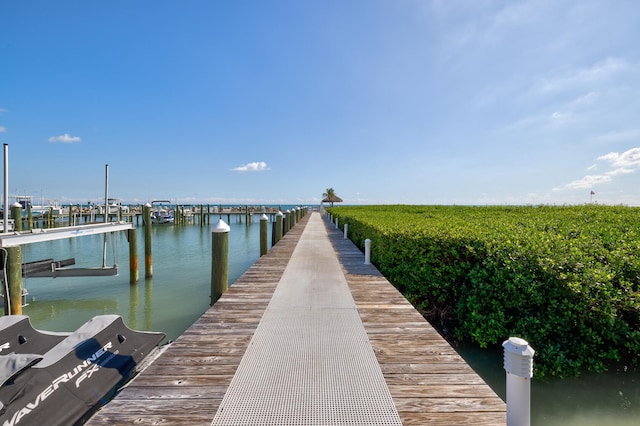 view of dock with a water view