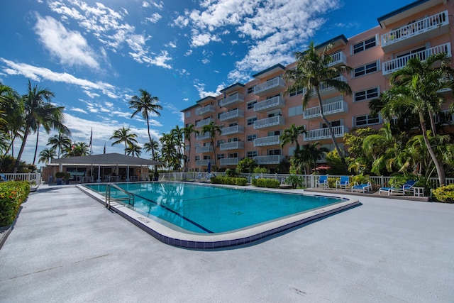 view of swimming pool with a patio