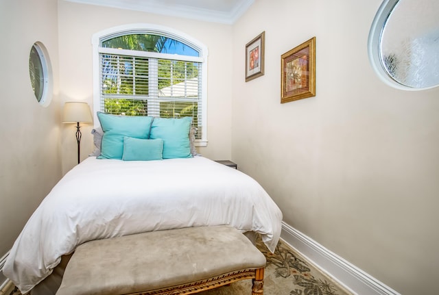 bedroom featuring ornamental molding