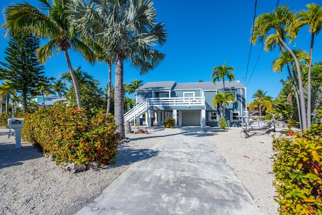 raised beach house with a carport