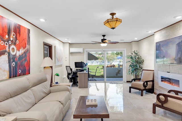 living room featuring ceiling fan, ornamental molding, a fireplace, and a wall mounted AC