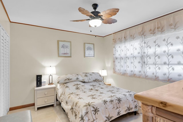 bedroom with crown molding and ceiling fan