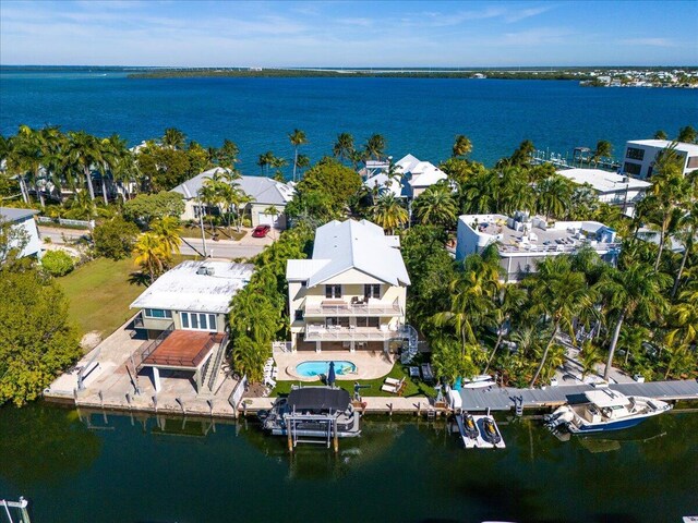 drone / aerial view featuring a water view