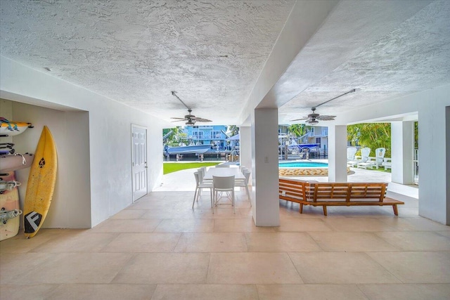 view of patio / terrace featuring ceiling fan and an outdoor hangout area