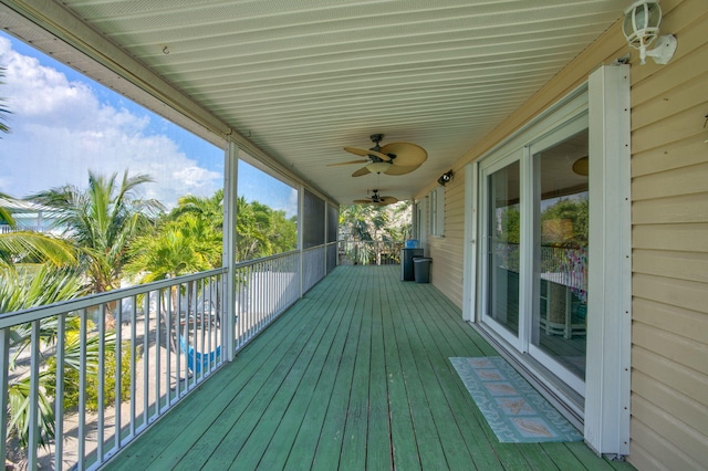 wooden terrace with ceiling fan