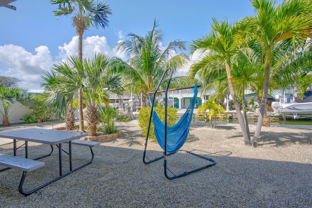 view of jungle gym featuring a patio area