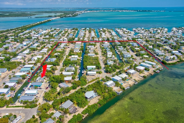 drone / aerial view featuring a water view