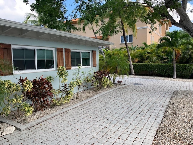 exterior space featuring stucco siding