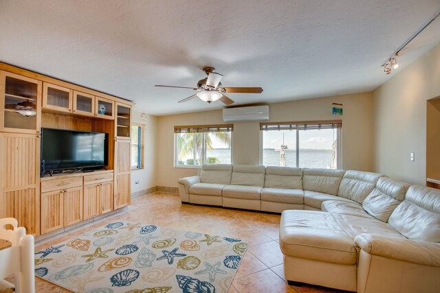 recreation room featuring light tile patterned flooring, lofted ceiling with skylight, wood ceiling, pool table, and ceiling fan