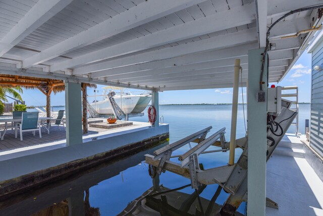 view of dock with a water view