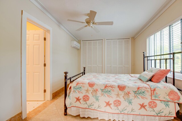 living area with an AC wall unit, light tile patterned floors, wine cooler, and ceiling fan