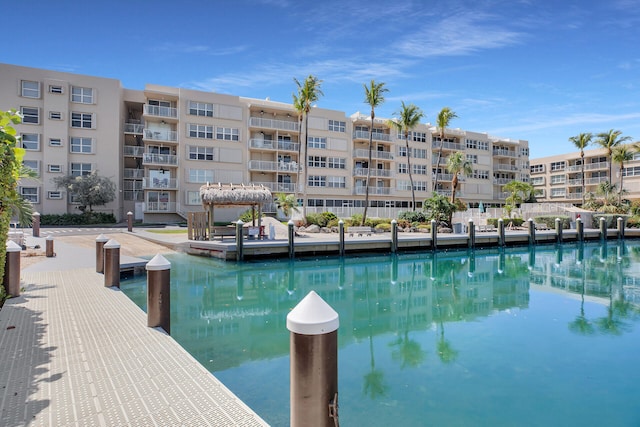 view of pool featuring a boat dock