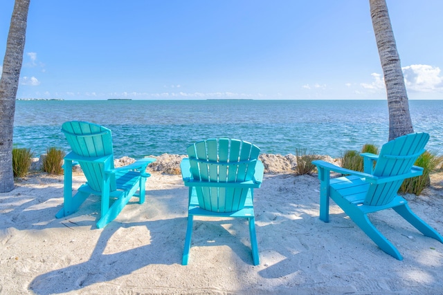 view of patio featuring a water view