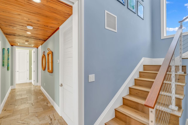 hallway featuring wooden ceiling