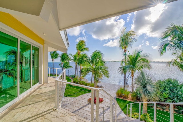 balcony featuring a water view