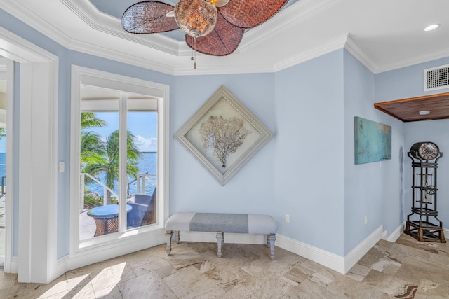 sitting room featuring crown molding