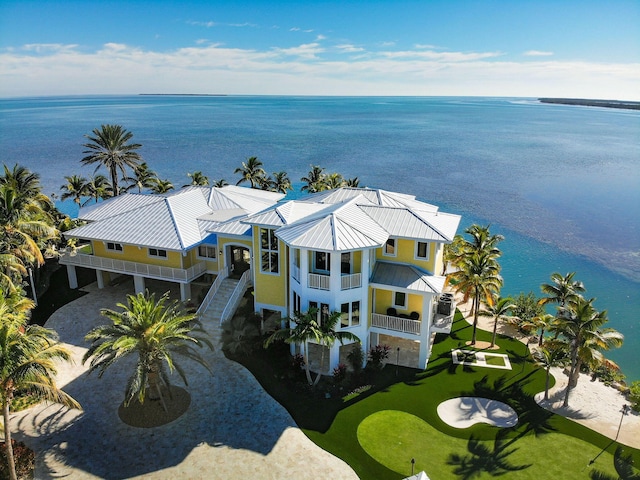 birds eye view of property featuring a water view