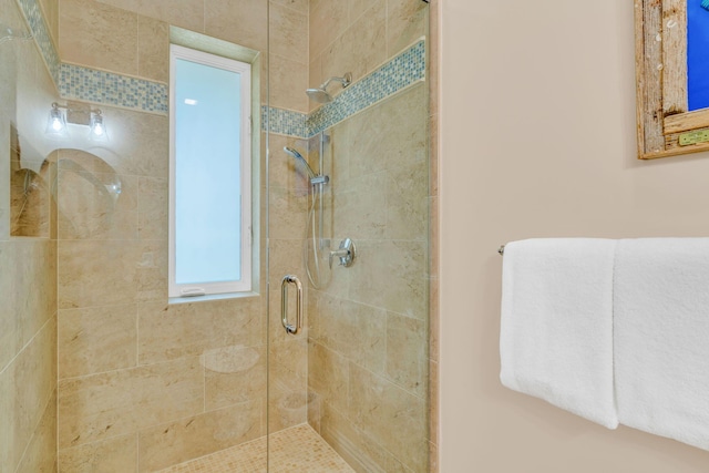 bathroom featuring an enclosed shower