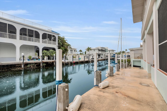 dock area with a water view