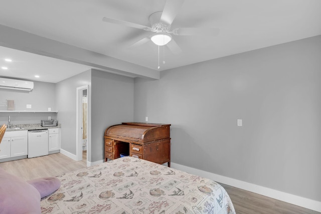 115 Primrose Ln, Long Key, FL 33001 - bedroom with a wall mounted air conditioner, light wood finished floors, and recessed lighting