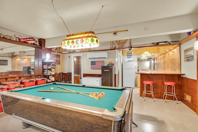 rec room featuring bar, a wall mounted AC, pool table, and wood walls