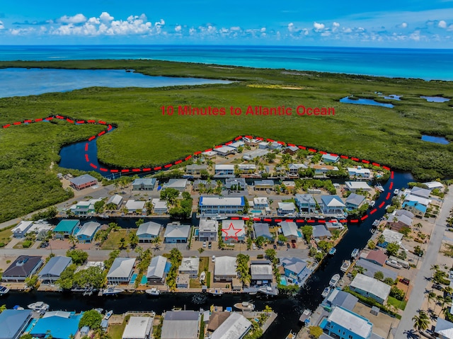 115 Primrose Ln, Long Key, FL 33001 - aerial view of residential area featuring a nearby body of water