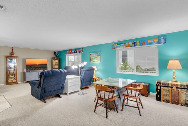 view of carpeted dining space