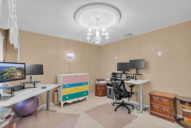 office featuring light colored carpet, a textured ceiling, and an inviting chandelier